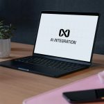 Coach using an AI notetaker on a laptop to capture session notes