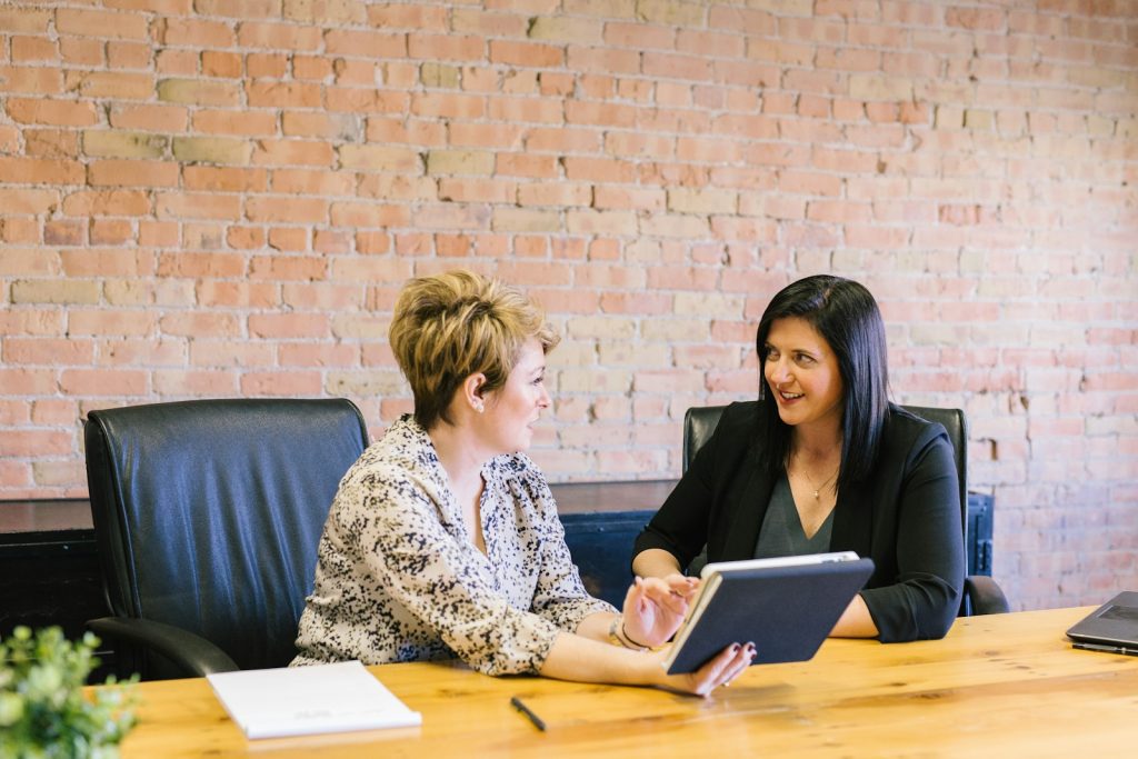Coach meeting with a client - client management software for coaches keeps every session in one place