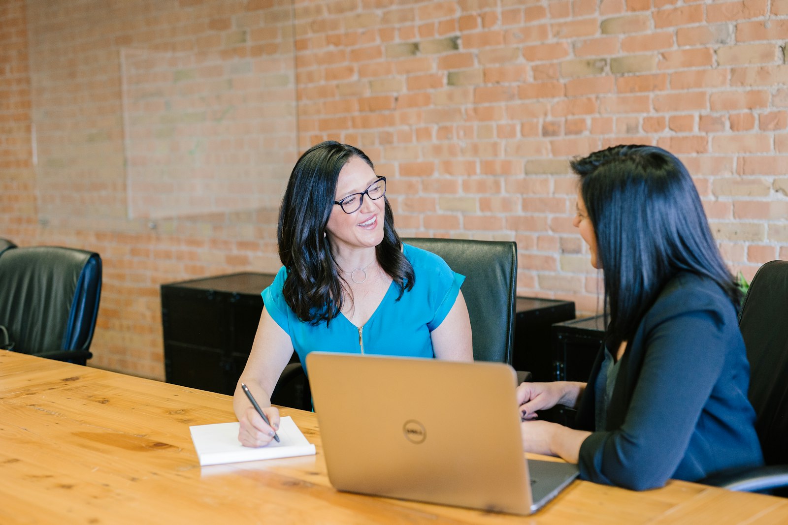 A coach in a focused one-on-one session with a client